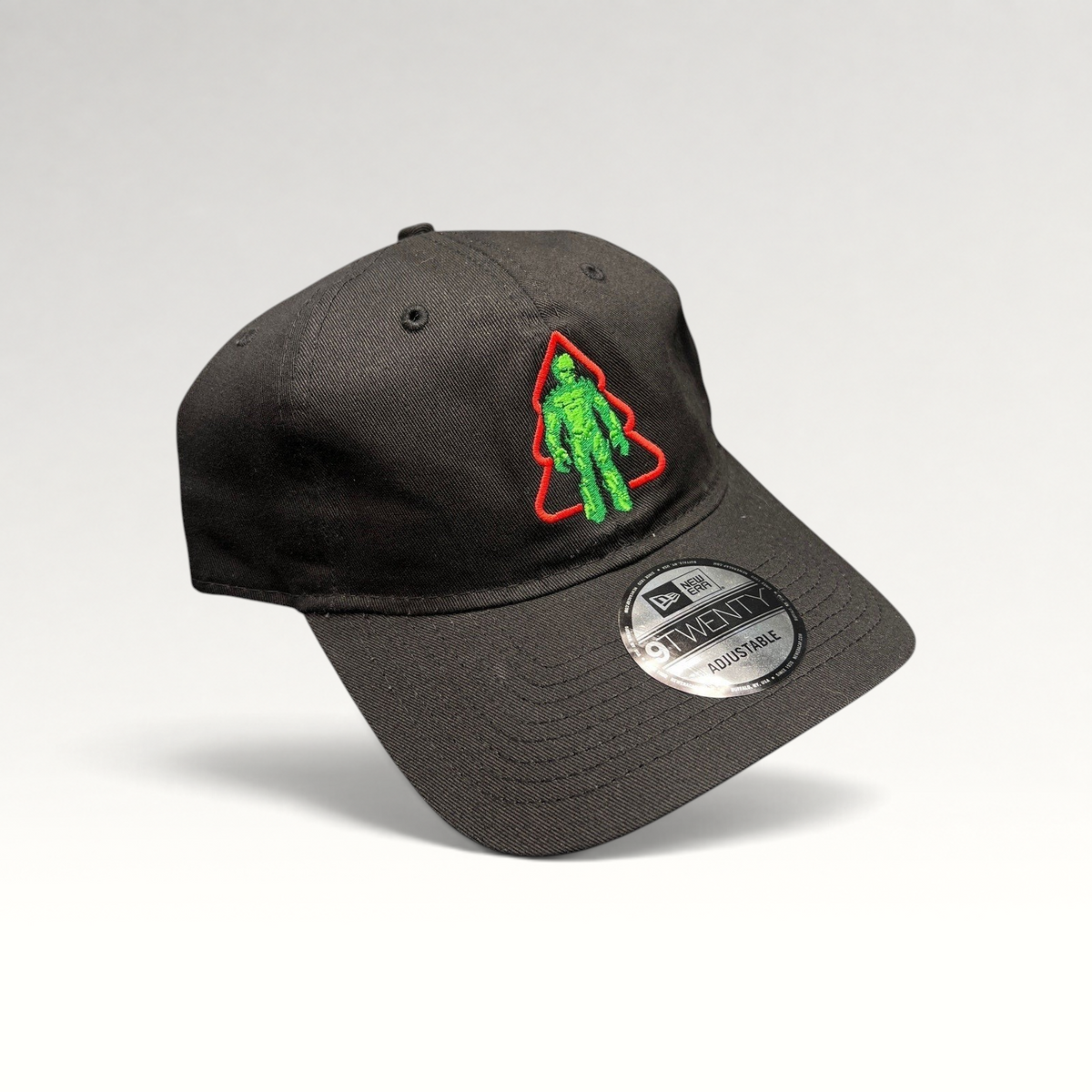 Raree Finds black New Era 9TWENTY cotton cap featuring a green Groot Christmas tree embroidery on the front.