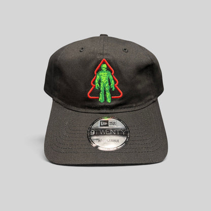 Raree Finds black New Era 9TWENTY cotton hat featuring an embroidered green Groot in a red Christmas tree outline.
