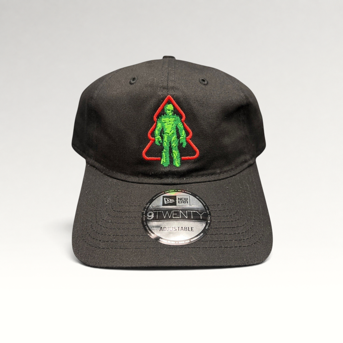 Raree Finds black New Era 9TWENTY cotton hat featuring an embroidered green Groot in a red Christmas tree outline.