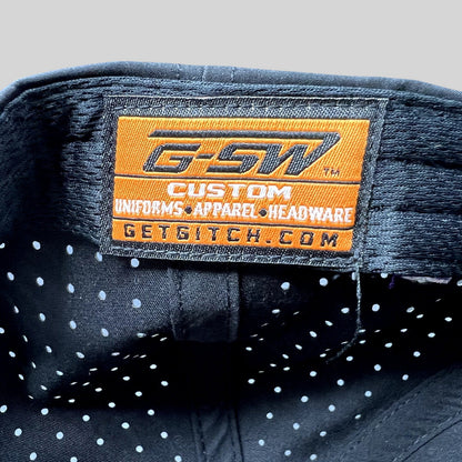 Raree Finds GSW Custom Apparel interior label inside a black perforated snapback hat from The Late Game production