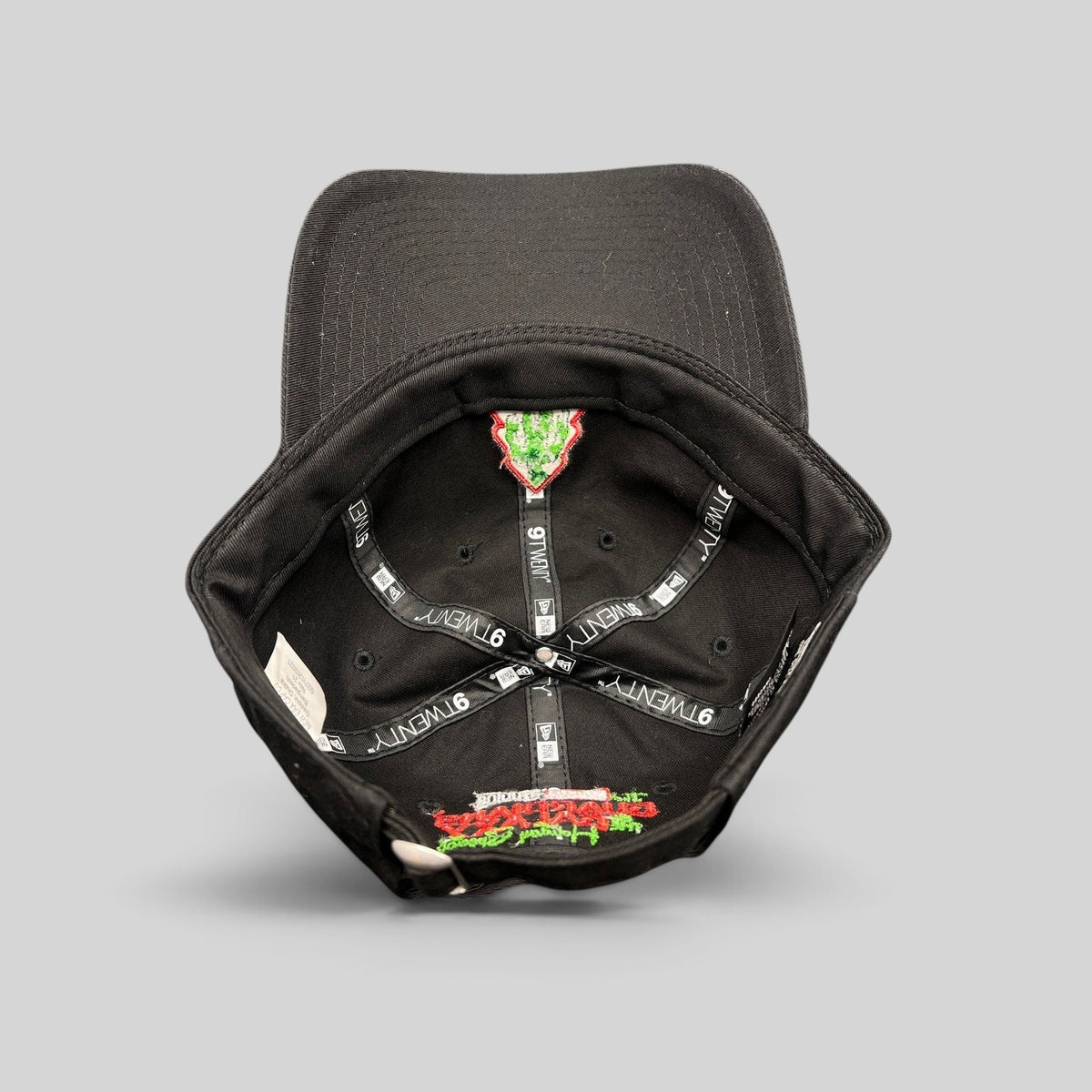 Raree Finds black New Era 9TWENTY cotton cap showing interior branding and Guardians of the Galaxy holiday embroidery
