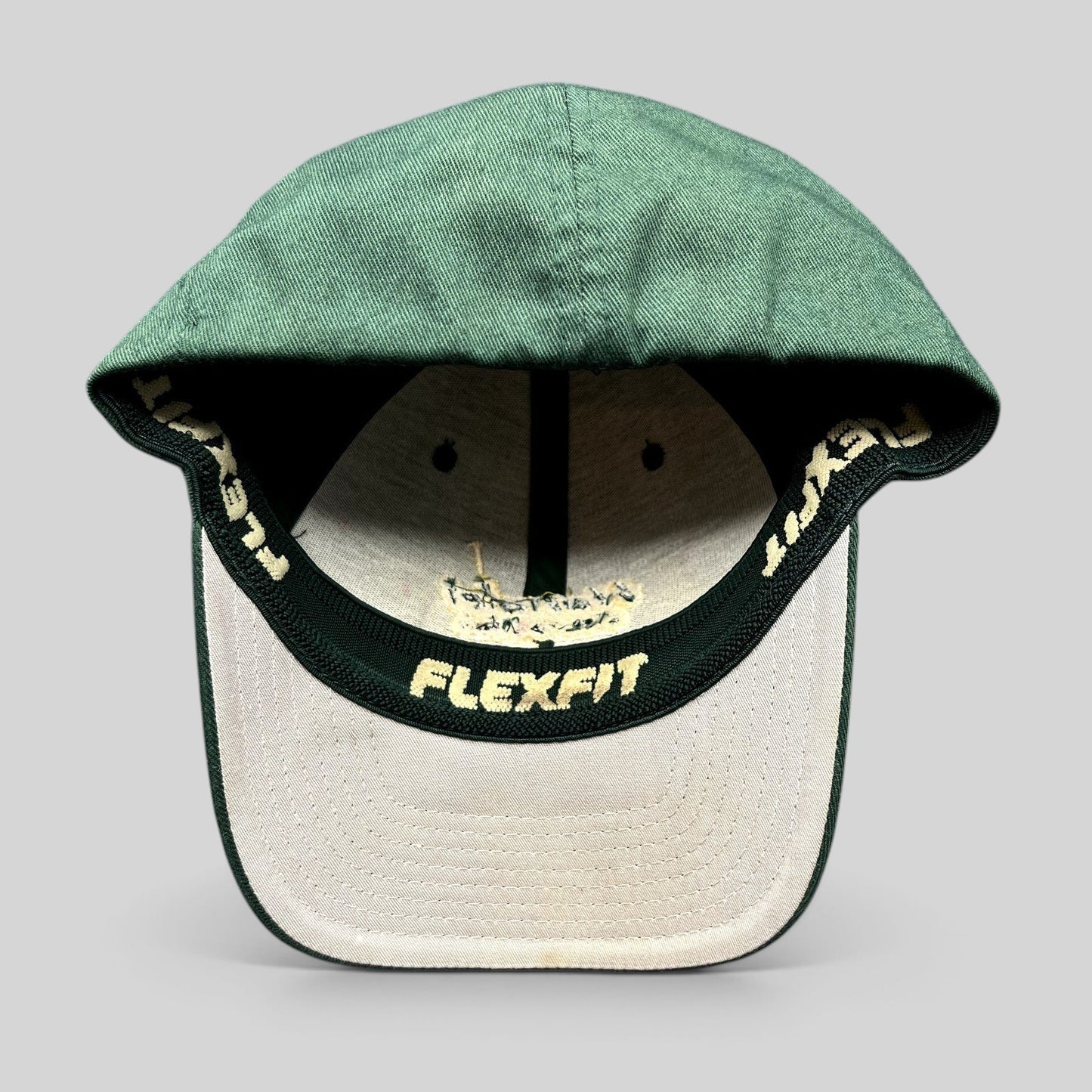 Raree Finds forest green Hanalei Canoe Club Flexfit hat with interior branding and gold embroidery details
