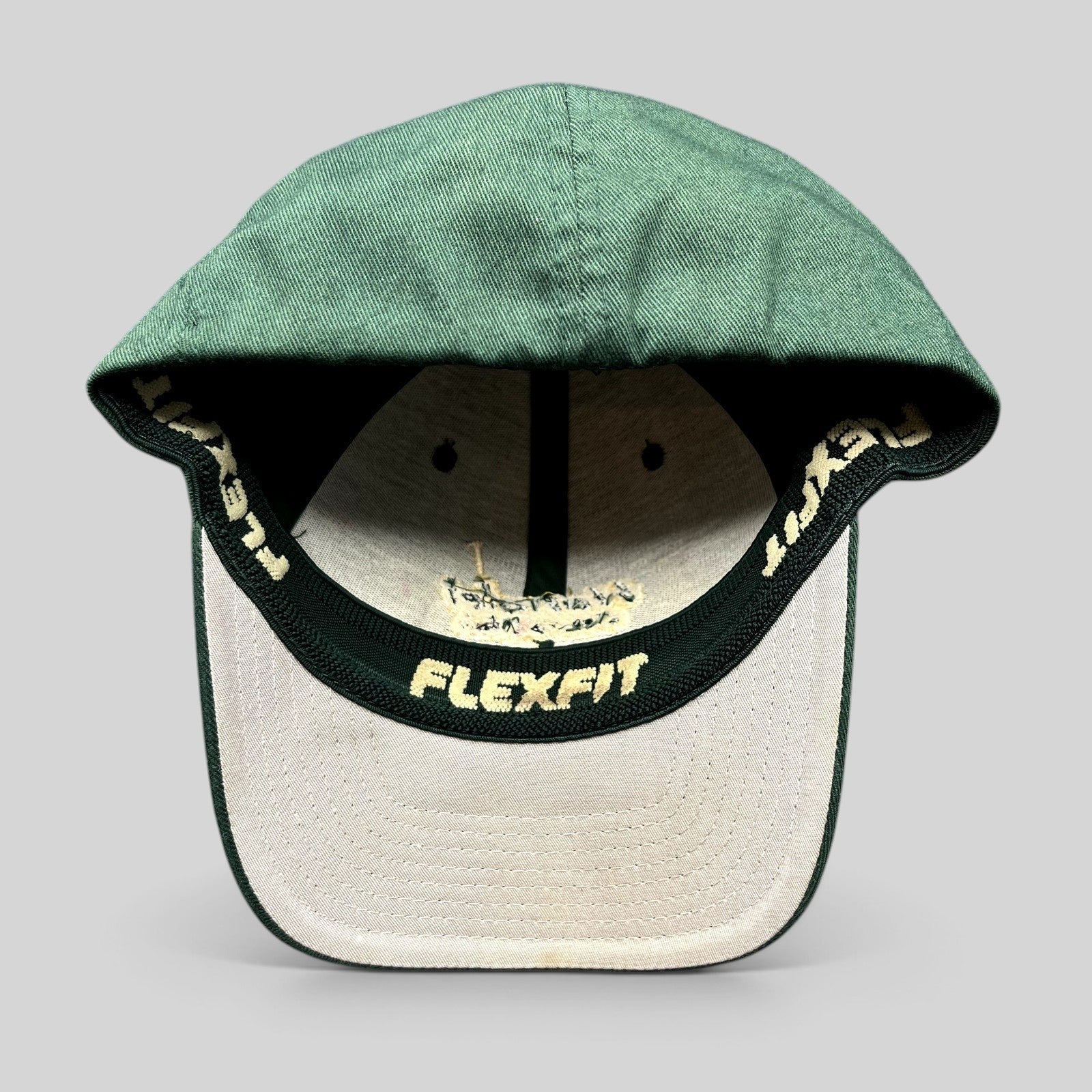 Raree Finds forest green Hanalei Canoe Club Flexfit hat with interior branding and gold embroidery details