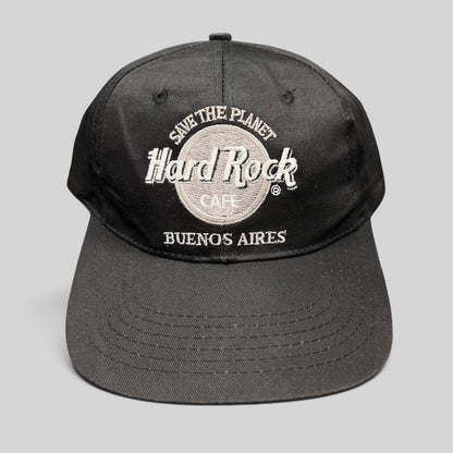 Raree Finds vintage black Hard Rock Cafe Buenos Aires snapback hat with white Save The Planet logo embroidery.