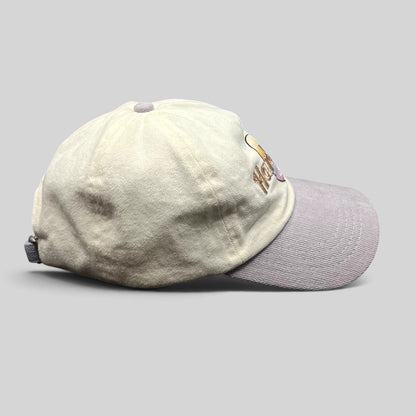 Raree Finds Hard Rock Cafe pastel dad hat with a cream cotton crown, lavender brim, and embroidered logo.