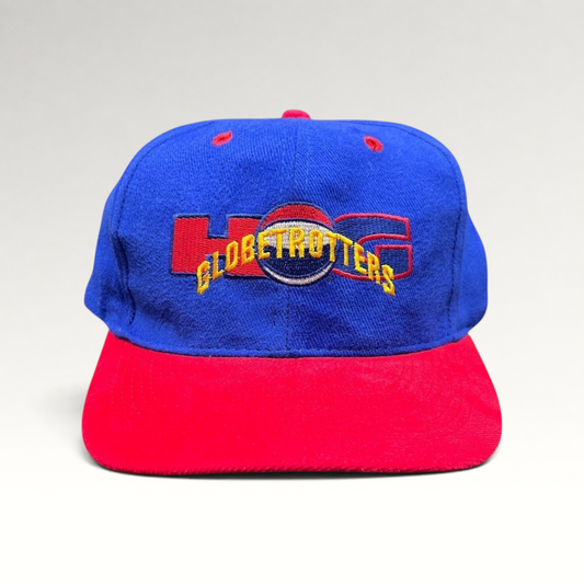 Raree Finds vintage 90s Harlem Globetrotters snapback hat with a royal blue crown, red brim, and embroidered logo.