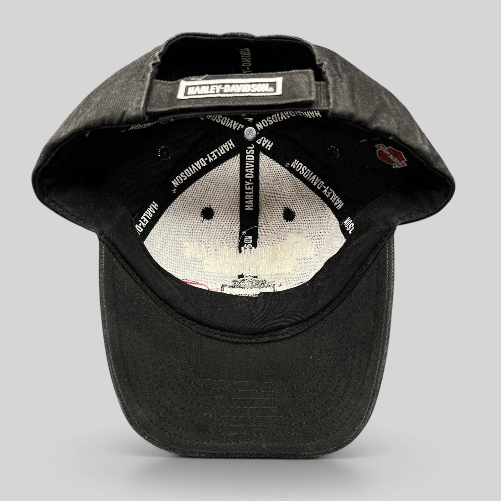 Raree Finds Harley-Davidson black cotton strapback hat interior view showing branded taping and adjustable strap