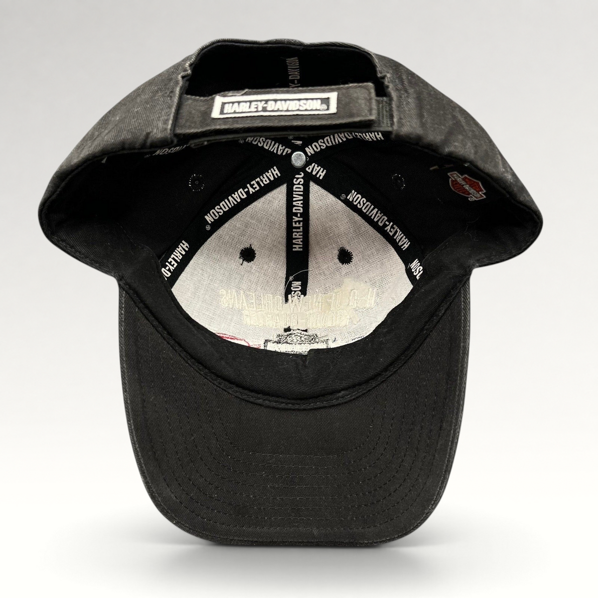 Raree Finds Harley-Davidson black cotton strapback hat interior view showing branded taping and adjustable strap