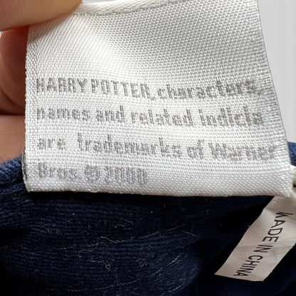 Raree Finds vintage Harry Potter 2000 Warner Bros copyright tag on navy blue fabric with Made in China label