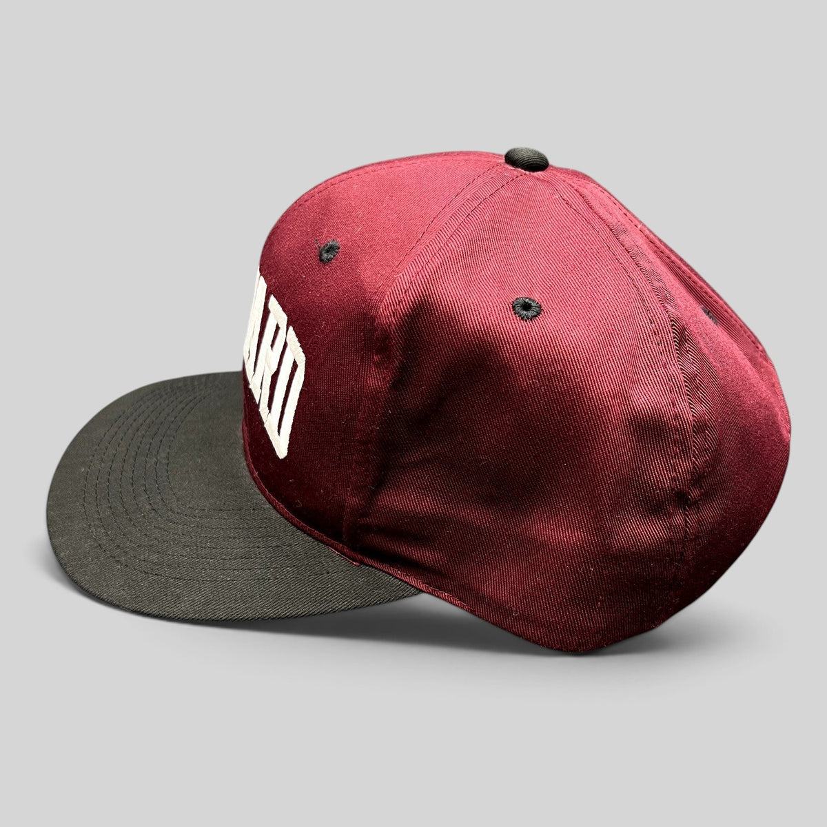 Raree Finds vintage Harvard University snapback hat in crimson and black with white raised embroidery