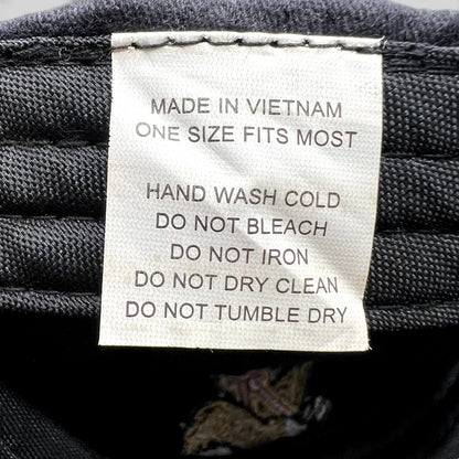 Raree Finds black cotton hat care label with washing instructions and origin details stitched on the interior