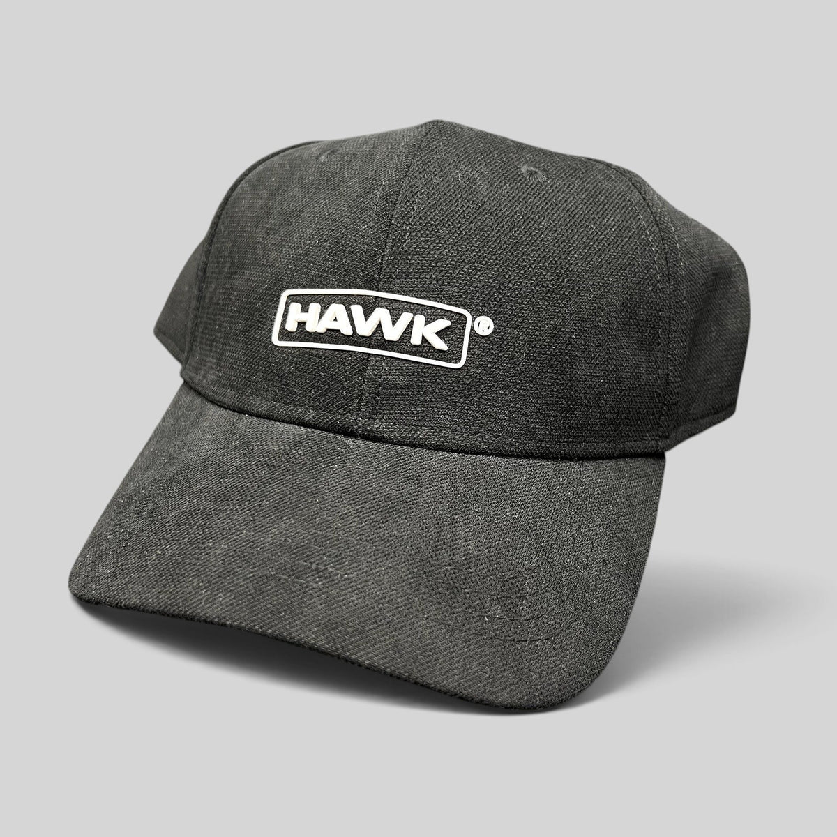Raree Finds black HAWK strapback cap with white embroidered boxed logo on lightweight polyamide fabric