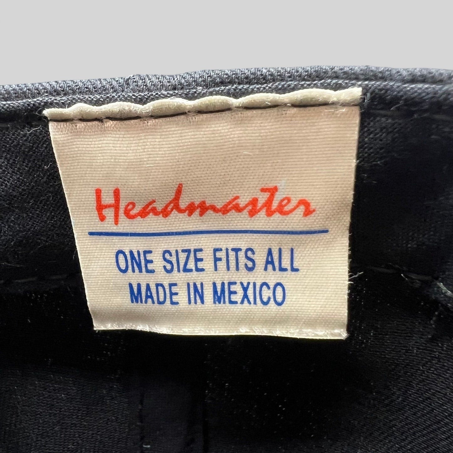 Raree Finds vintage Headmaster snapback hat interior label showing size and manufacturing details
