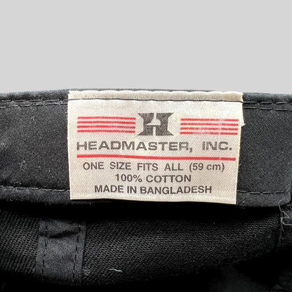 Raree Finds vintage Headmaster cotton hat interior tag with brand logo and size information on black fabric
