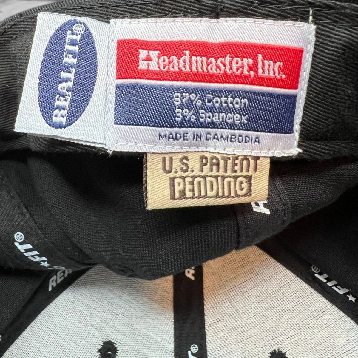 Raree Finds vintage Headmaster Inc. Real Fit hat interior tag showing cotton spandex blend and patent pending label