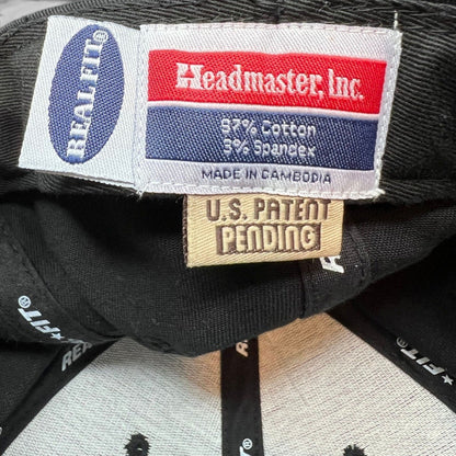 Raree Finds vintage Headmaster Inc. Real Fit hat interior tag showing cotton spandex blend and patent pending label