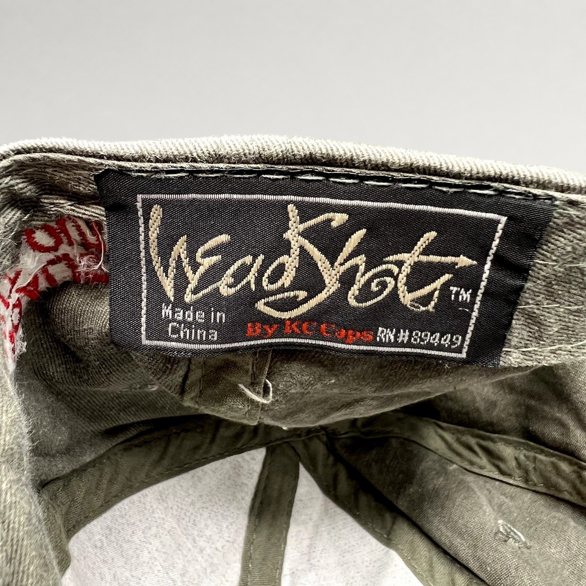 Raree Finds vintage HeadShot by KC Caps hat interior label showing brand details and manufacturing origin