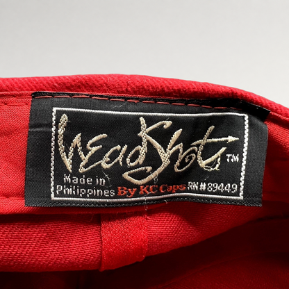 Raree Finds vintage Headshots by KC Caps label inside a bright red promotional hat made in the Philippines