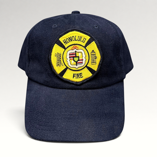 Raree Finds vintage navy blue Nissun strapback hat with a yellow Honolulu Fire Department embroidered patch