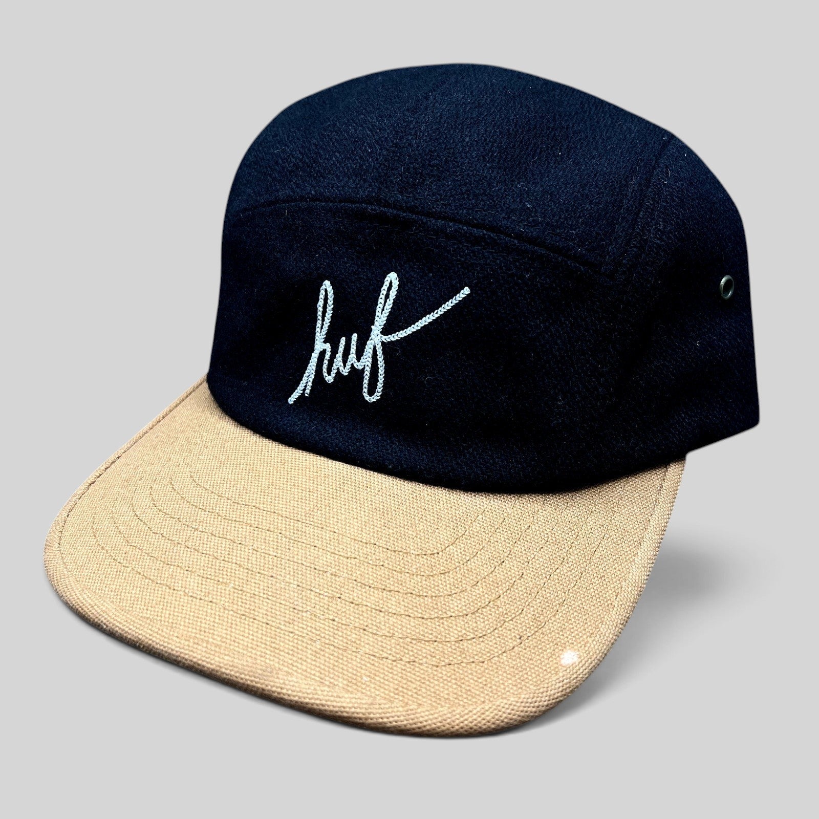 Raree Finds HUF black wool-style camp hat with a tan brim and white embroidered script logo on the front