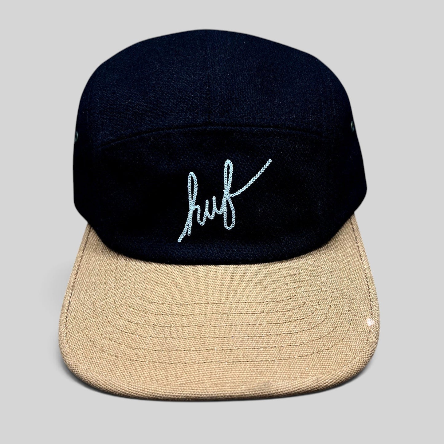 Raree Finds HUF black camp hat with a tan brim and white embroidered script logo on the front