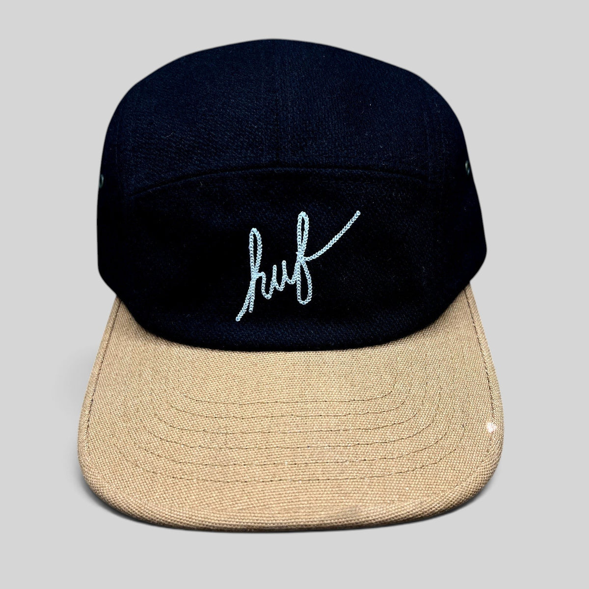 Raree Finds HUF black camp hat with a tan brim and white embroidered script logo on the front