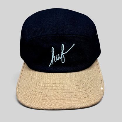 Raree Finds HUF black camp hat with a tan brim and white embroidered script logo on the front