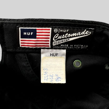 Raree Finds HUF Custom Made Headwear interior label with American flag graphic on a black camp hat