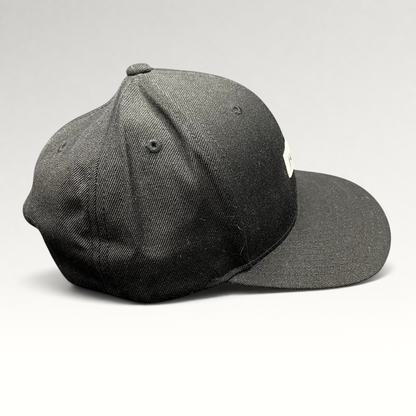 Raree Finds black Hurley snapback hat with a structured crown and flat brim, featuring a woven front logo patch.