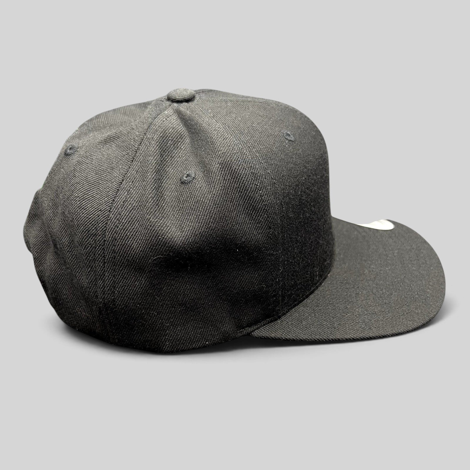 Raree Finds Hurley black Yupoong snapback hat with a structured crown and flat brim in a classic skate style.