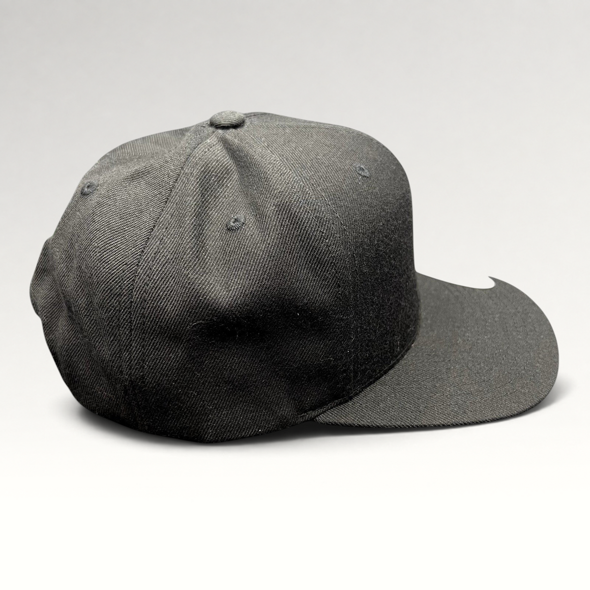 Raree Finds Hurley black Yupoong snapback hat with a structured crown and flat brim in a classic skate style.