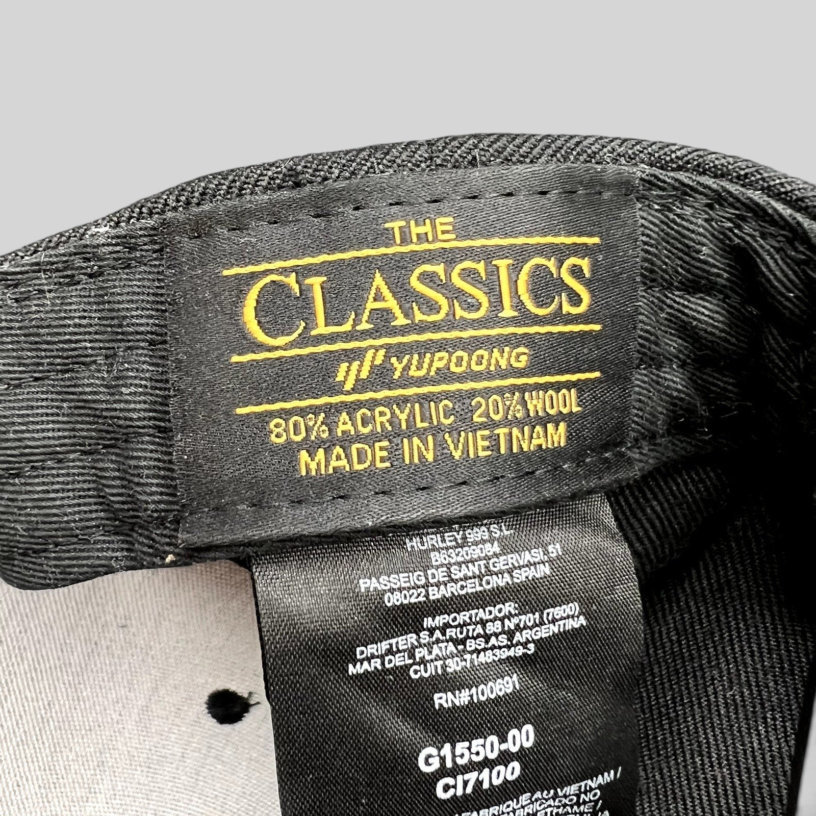 Raree Finds Hurley Yupoong The Classics snapback hat interior label showing material composition and origin