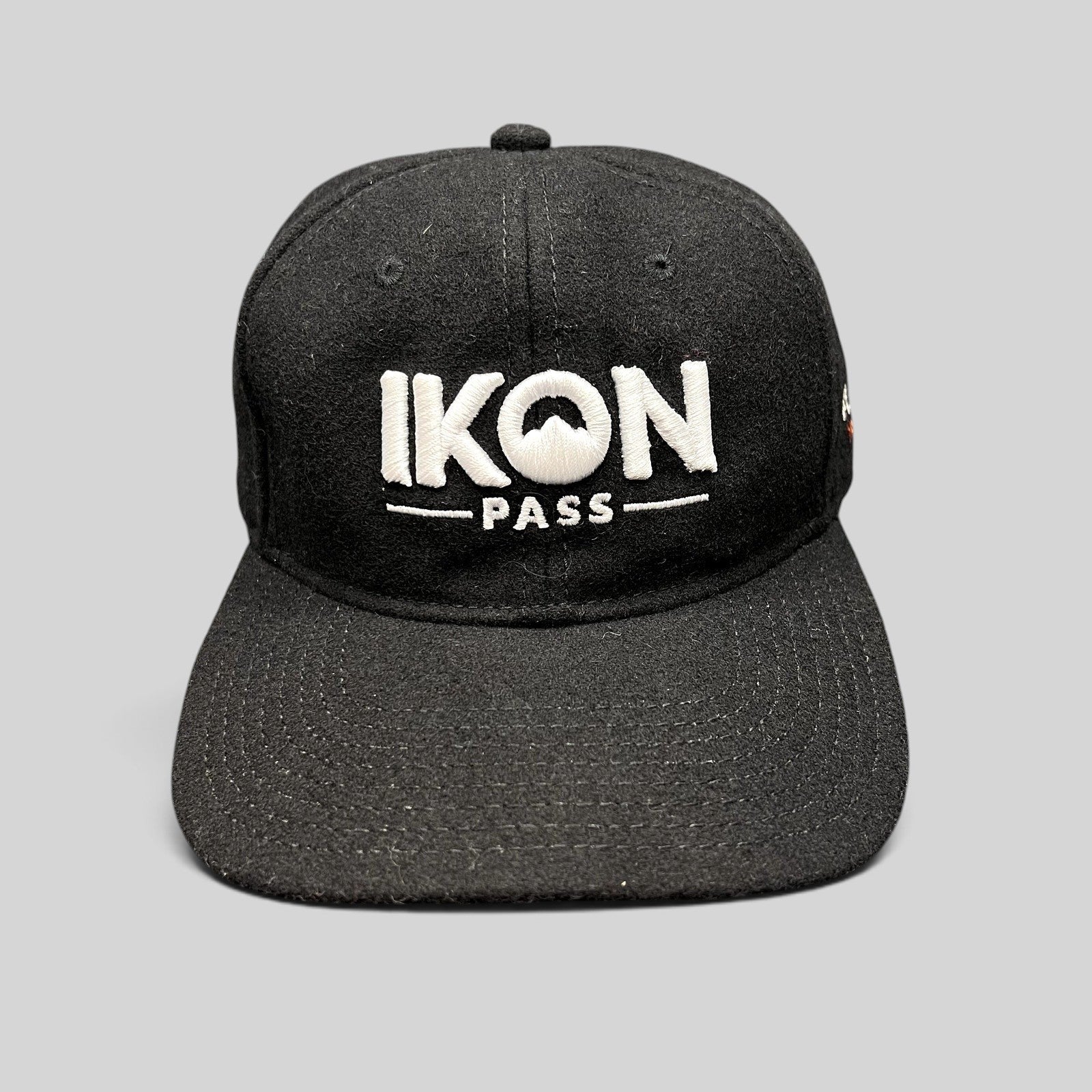 Raree Finds black wool-blend Ikon Pass strapback hat with white embroidered logo, front view
