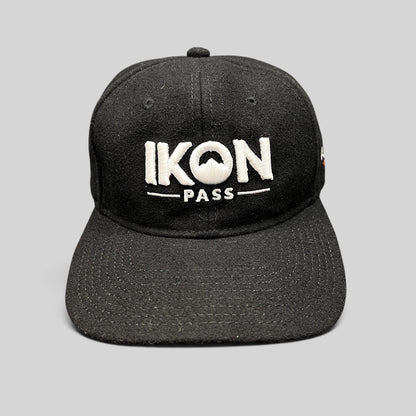 Raree Finds black wool-blend Ikon Pass strapback hat with white embroidered logo, front view