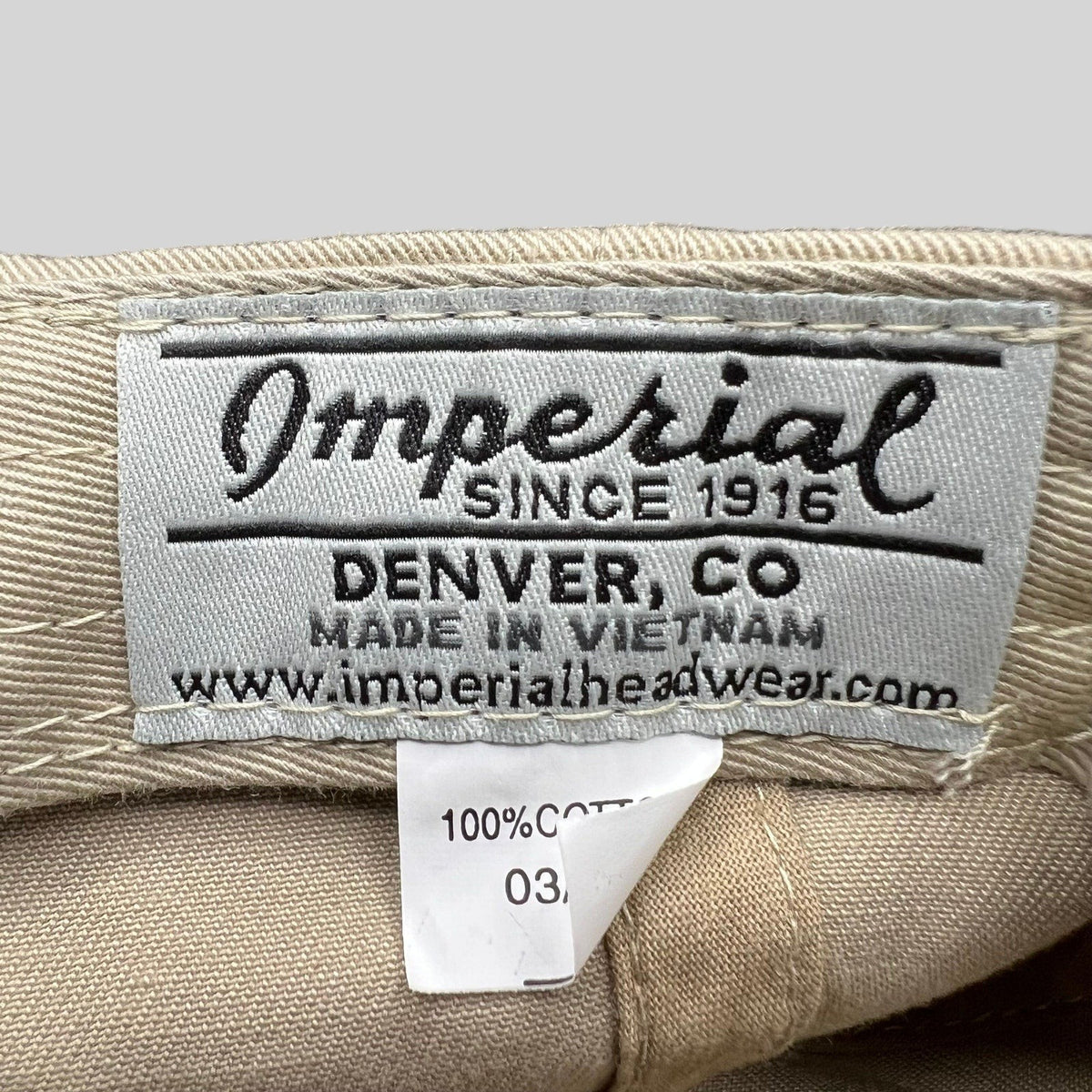 Raree Finds vintage Imperial hat interior tag showing brand details and 100 percent cotton material label