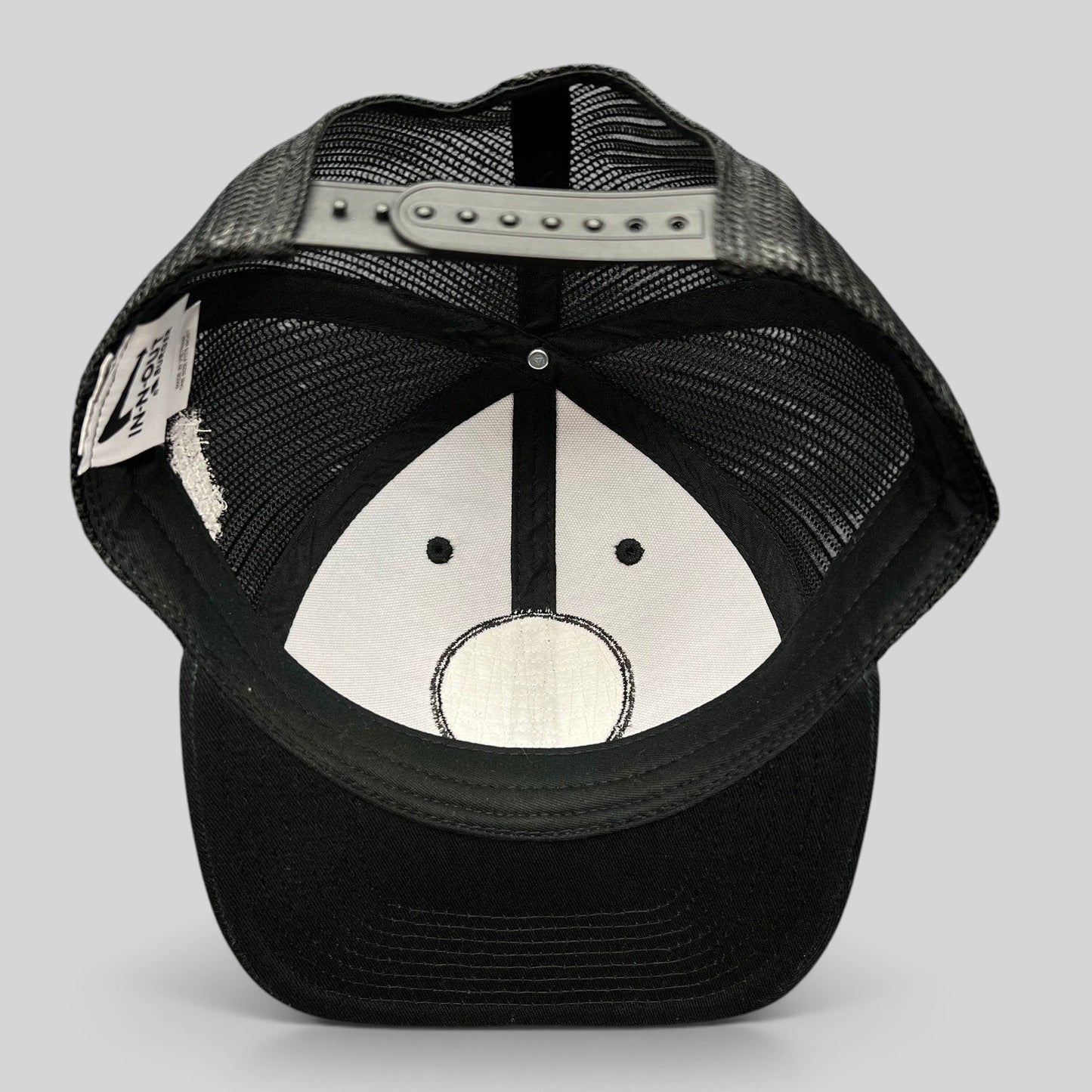 Raree Finds black In-N-Out Burger Rock 2 Freedom trucker hat interior view showing mesh back and snapback closure
