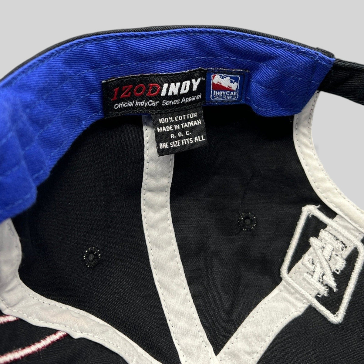 Raree Finds vintage IZOD IndyCar Series hat interior showing cotton construction and official branding tags