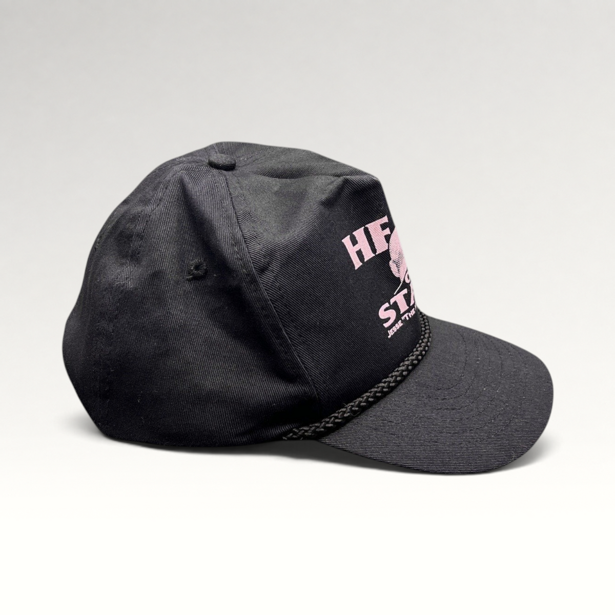 Raree Finds vintage Jesse Ventura Head of State black cotton snapback hat with pink graphic and front rope trim