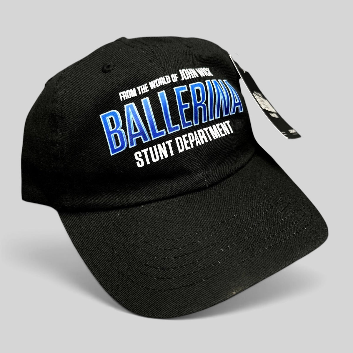 Raree Finds black cotton strapback hat featuring John Wick Ballerina Stunt Department embroidery and original hang tag.