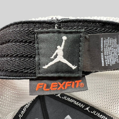 Raree Finds Jordan MJ Invitational hat interior showing Jumpman logo patch and Flexfit tag on mesh lining