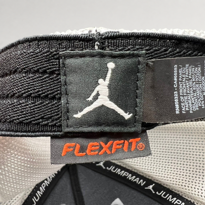 Raree Finds Jordan MJ Invitational hat interior showing Jumpman logo patch and Flexfit tag on mesh lining