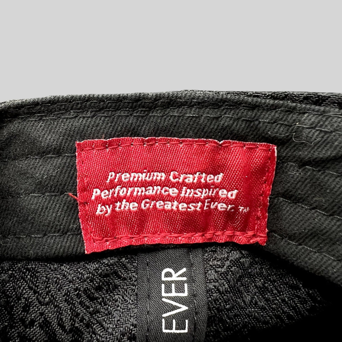 Raree Finds Jordan snapback interior red woven label with white text Premium Crafted Performance Inspired by the Greatest