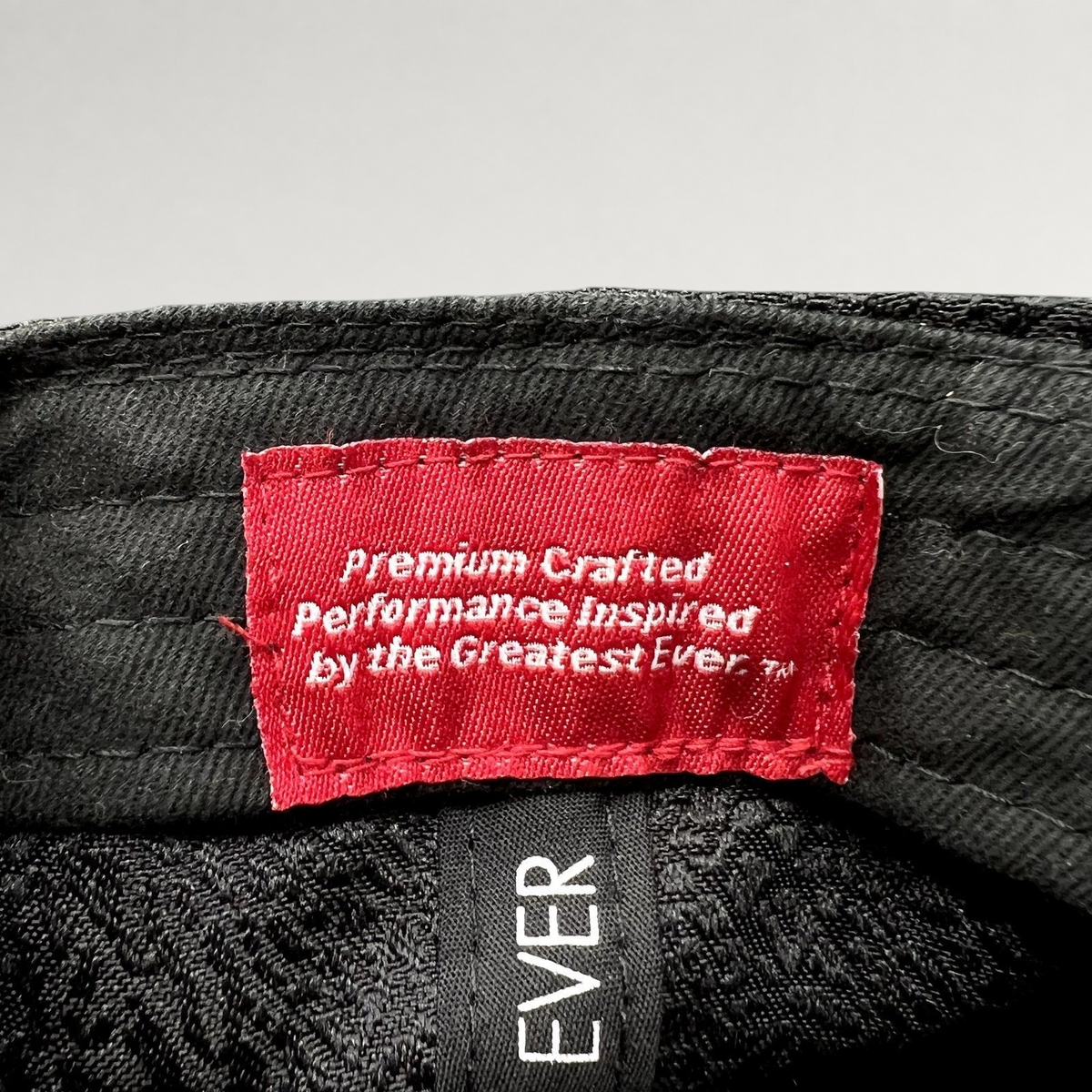 Raree Finds Jordan snapback interior red woven label with white text Premium Crafted Performance Inspired by the Greatest