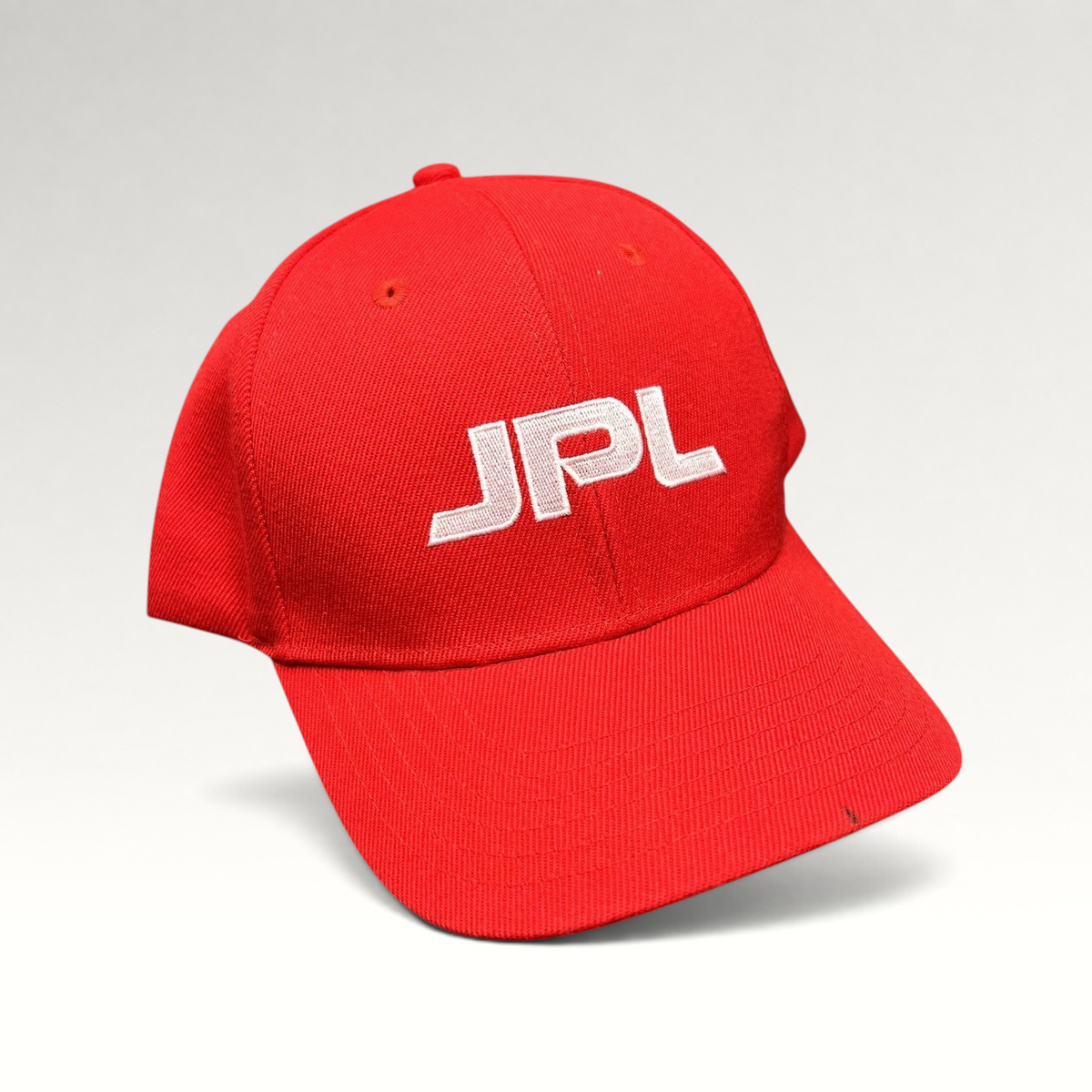 Raree Finds red JPL NASA snapback hat with white embroidered logo on a structured crown