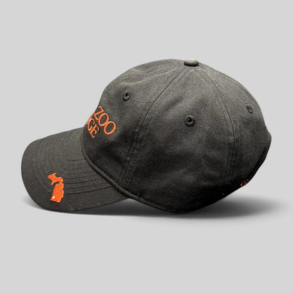 Raree Finds Kalamazoo College black cotton dad cap with orange embroidered lettering and Michigan state logo on brim