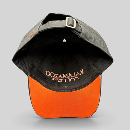Raree Finds Kalamazoo College black cotton dad cap with orange underbill and adjustable metal strapback buckle