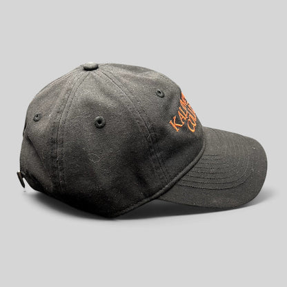 Raree Finds Kalamazoo College black cotton twill dad cap with orange embroidered lettering and contrast underbill