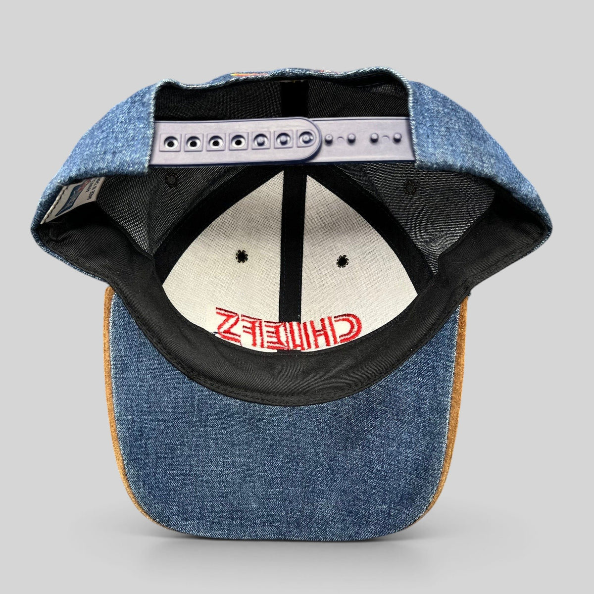 Raree Finds vintage Kansas City Chiefs Annco snapback hat showing the interior denim crown and plastic snap closure