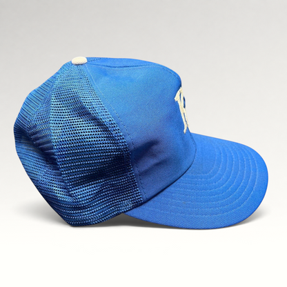 Raree Finds vintage Kansas City Royals trucker hat in royal blue with mesh back and off-white KC embroidery