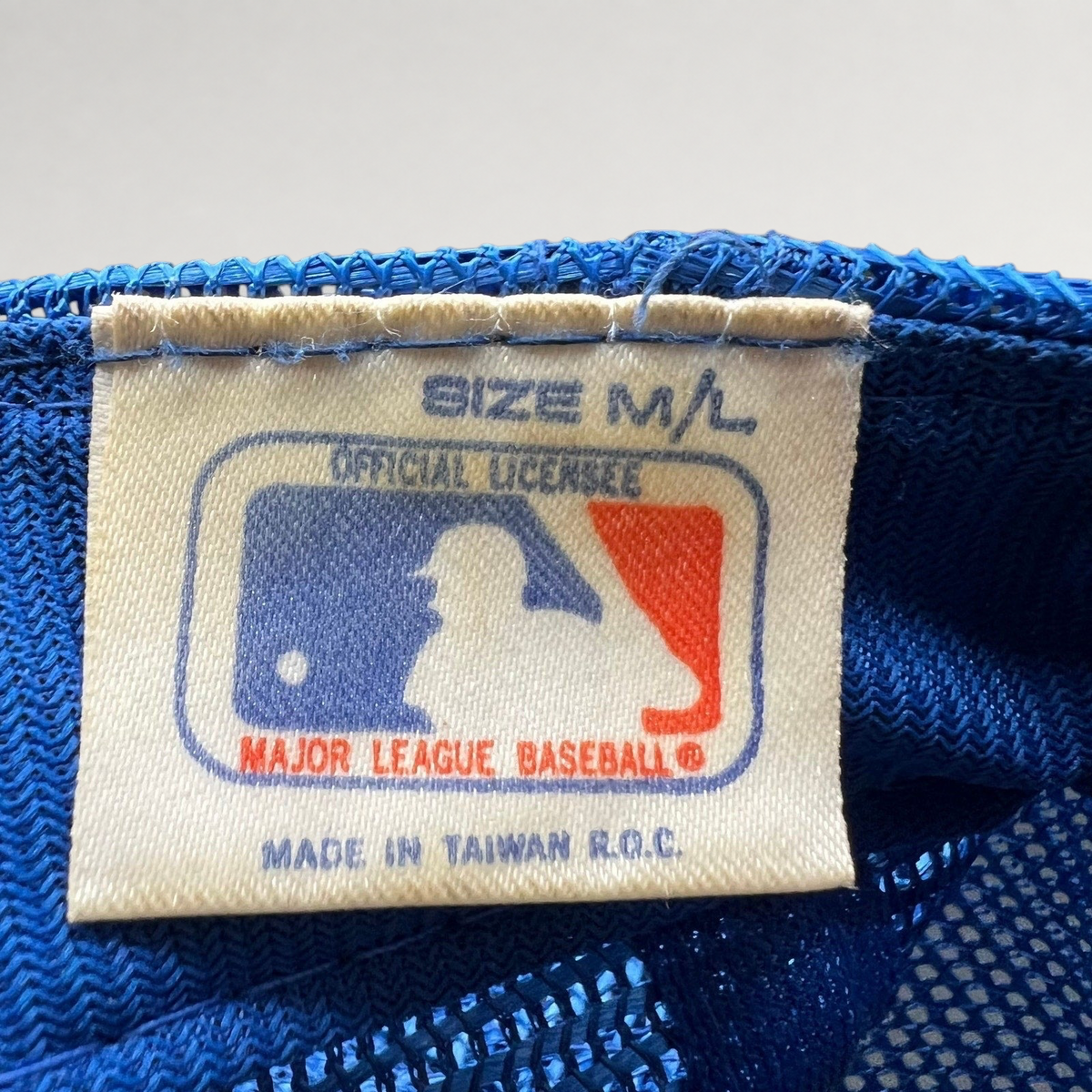 Raree Finds vintage Kansas City Royals hat interior tag showing MLB official licensee branding and made in Taiwan text
